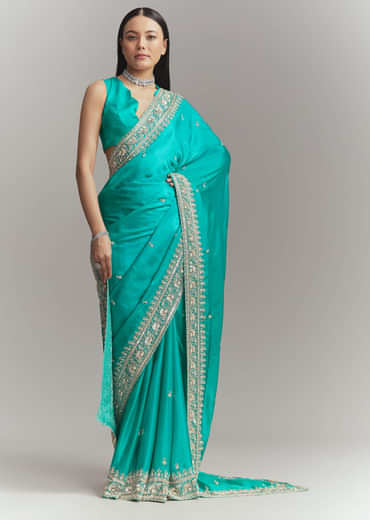 Turquoise Blue Satin Embroidered Saree With Heavy Hand Embroidery