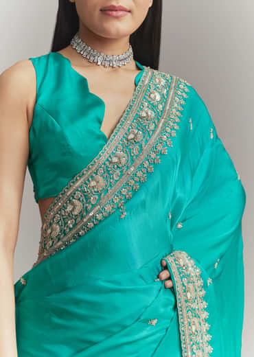 Turquoise Blue Satin Embroidered Saree With Heavy Hand Embroidery