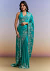 Turquoise Blue Satin Saree With Heavy Embroidered Details