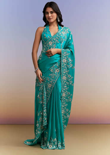 Turquoise Blue Satin Saree With Heavy Embroidered Details