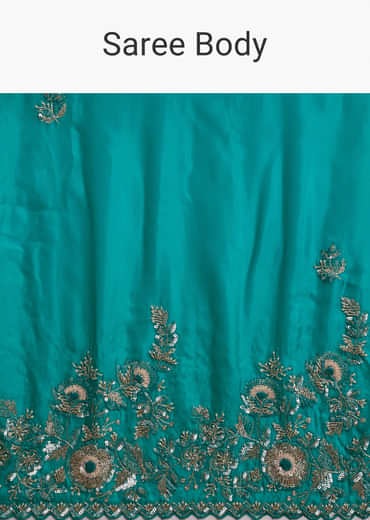 Turquoise Blue Satin Saree With Heavy Embroidered Details