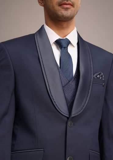 Tuxedo With Intricate Cut Work In Blue