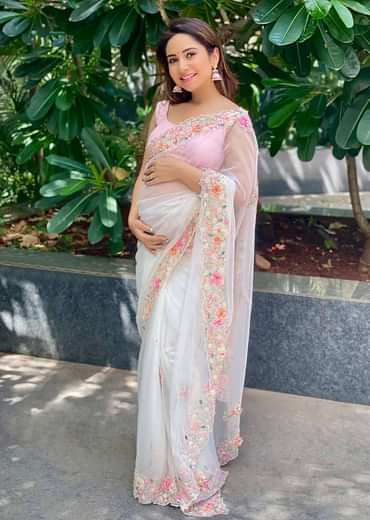 Powder White Saree In Organza With 3D Flower Embroidered Border And Buttis Featuring Multi Colored Moti And Sequins