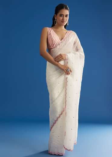 White Crepe Silk Saree With Mirror Scallop Border And Pink Contrast Blouse