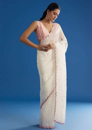 White Crepe Silk Saree With Mirror Scallop Border And Pink Contrast Blouse