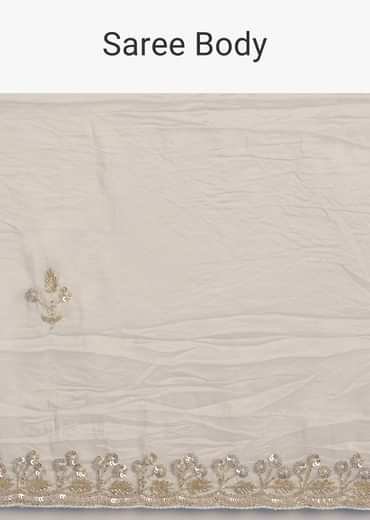 White Crushed Tissue Saree With Stones And Sequins Embroidery And Scallop Border