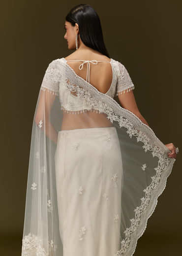 White Net Saree With All Over Embroidery
