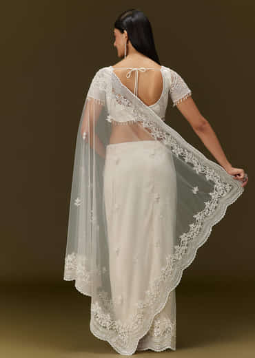 White Net Saree With All Over Embroidery