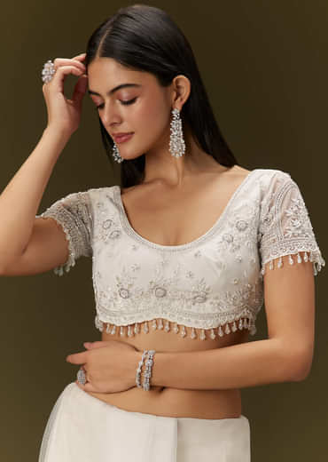 White Net Saree With All Over Embroidery