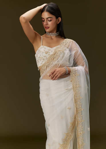 White Net Heavy Embroidered Saree With Embellished Border