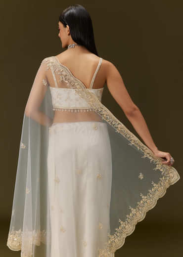 White Net Heavy Embroidered Saree With Embellished Border