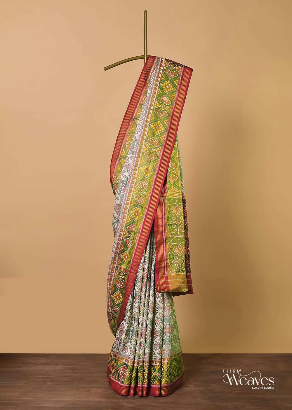 White Cotton Silk Saree With Ikat Patola Work And Unstitched Blouse Fabric