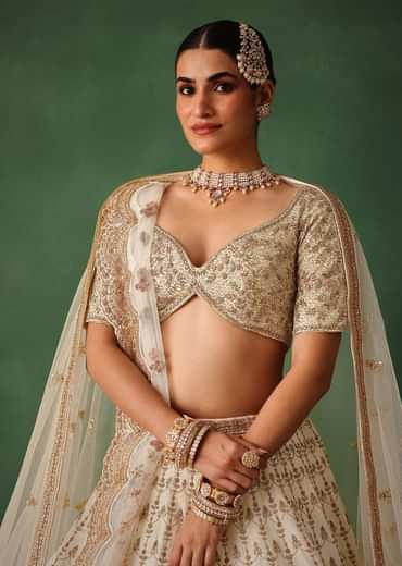 White Hand Embroidered Lehenga Set In Raw Silk
