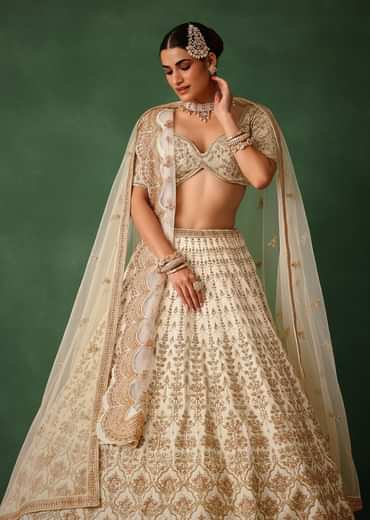 White Hand Embroidered Lehenga Set In Raw Silk