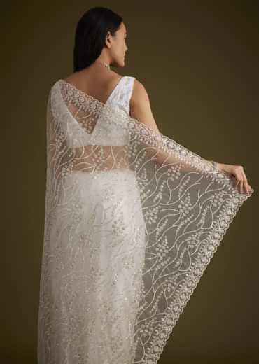 White Net Saree With Sequins And Stones Embroidery