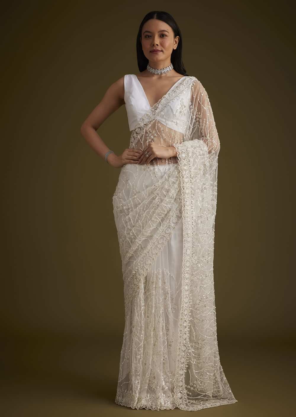 White Net Saree With Sequins And Stones Embroidery
