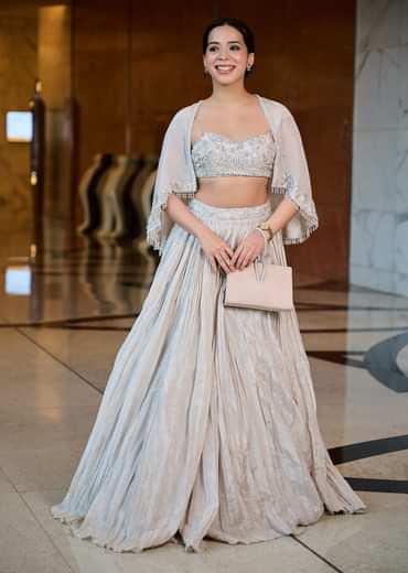 White Ruched Lehenga With Spaghetti Blouse And Cape