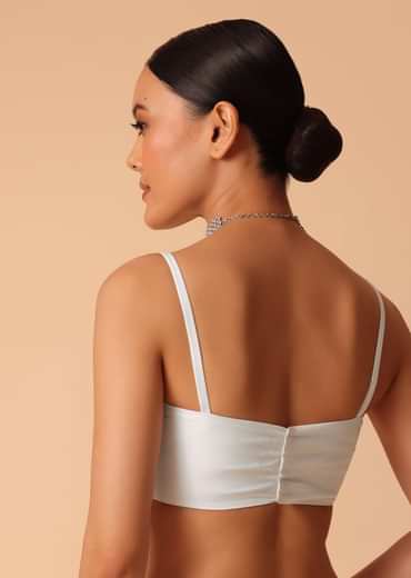 White Saree In Organza With Floral Motif Border And Unstitched Blouse Piece