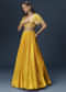 Yellow Bridesmaid Lehenga With Sleeveless Blouse And Draped Cape