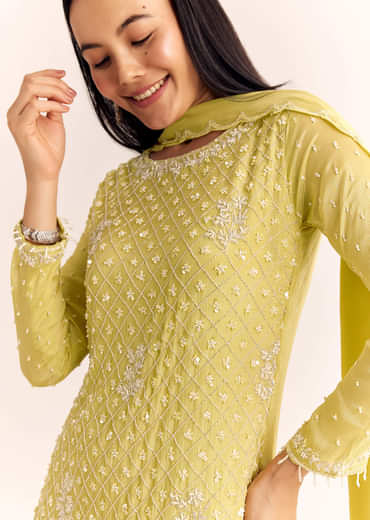 Yellow Chinon Sharara Dupatta Suit With Cutdana Moti And Sequins