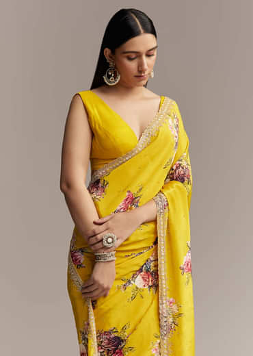 Yellow Crepe Saree With Multicolor Floral Print And Embellished Border