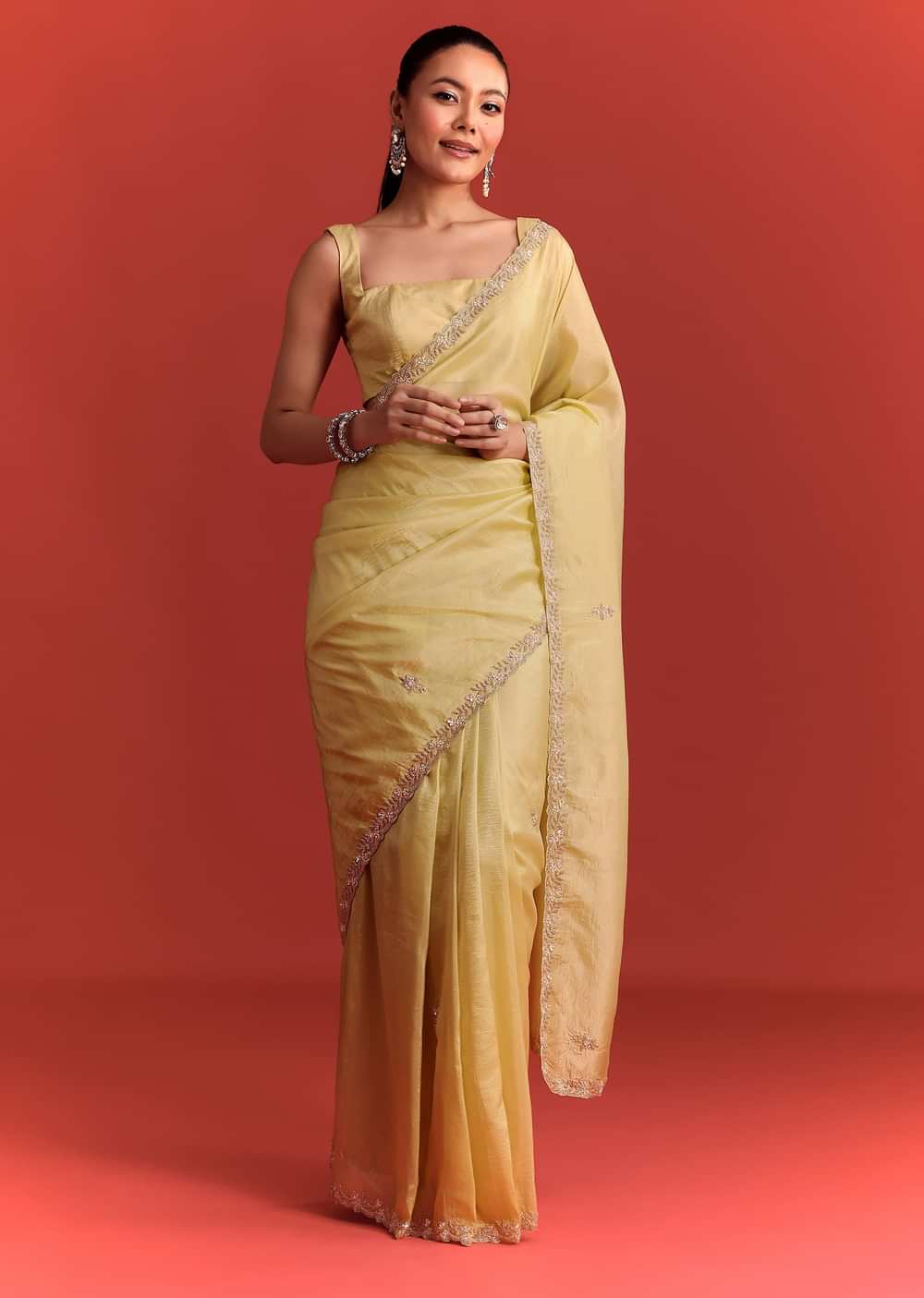 Yellow Crushed Tissue Saree With Cutdana Work